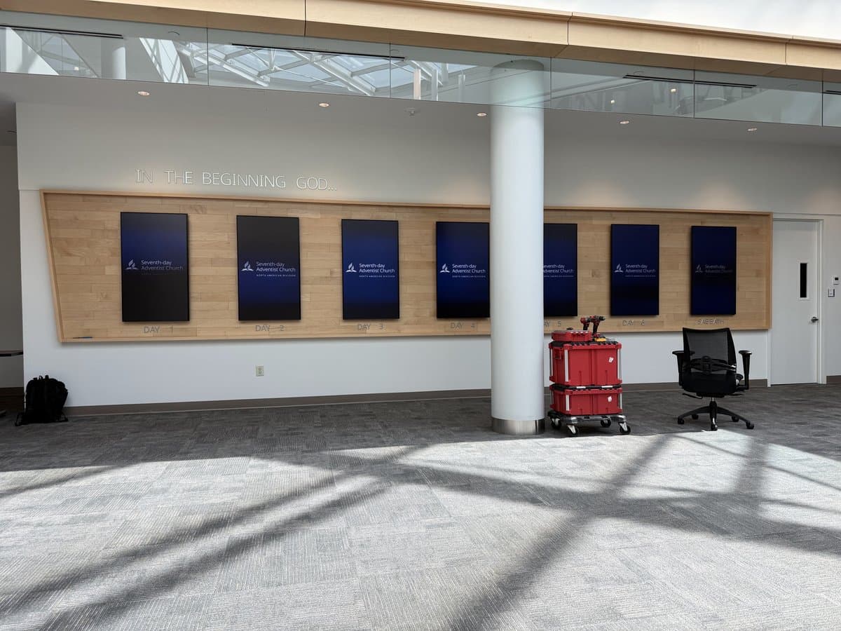 RTZ-installed lobby digital signage wall with portrait displays at NAD headquarters